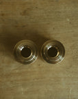 Box of two candle holders brass - FOLIES 1920