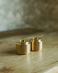 Box of two candle holders brass - FOLIES 1920