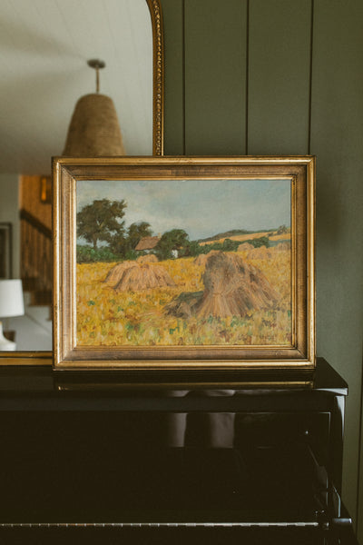 "Golden Harvest Field with Haystacks"